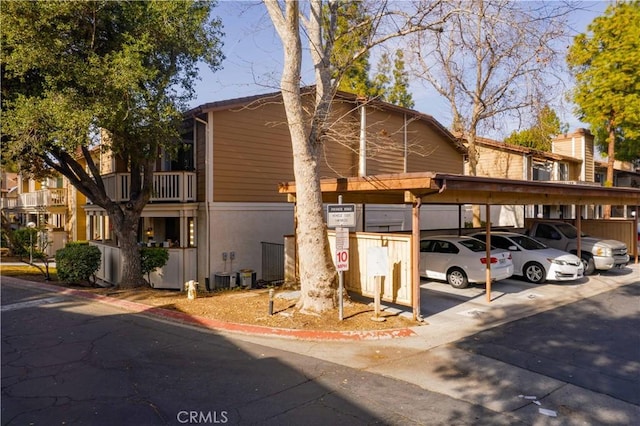 view of front facade featuring a carport