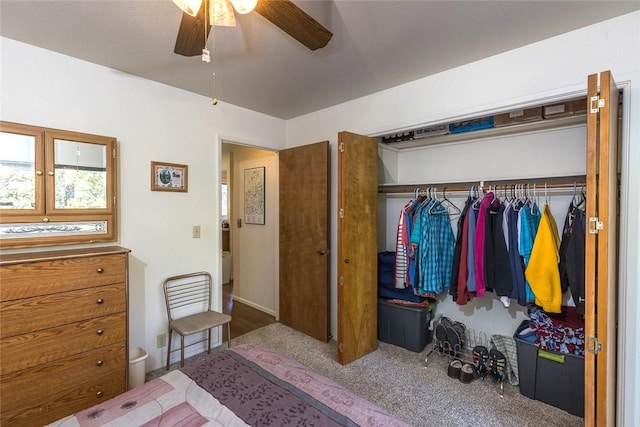 bedroom featuring ceiling fan, carpet floors, and a closet