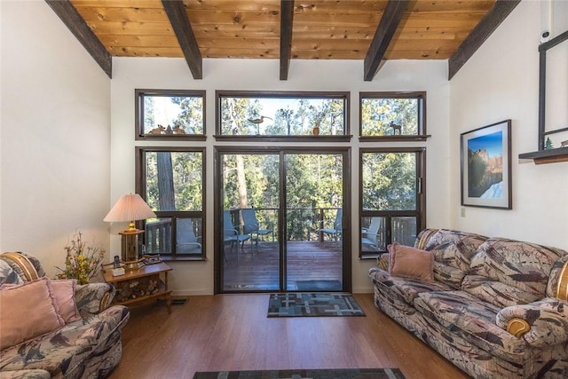 doorway to outside with wood-type flooring, a wealth of natural light, and wooden ceiling