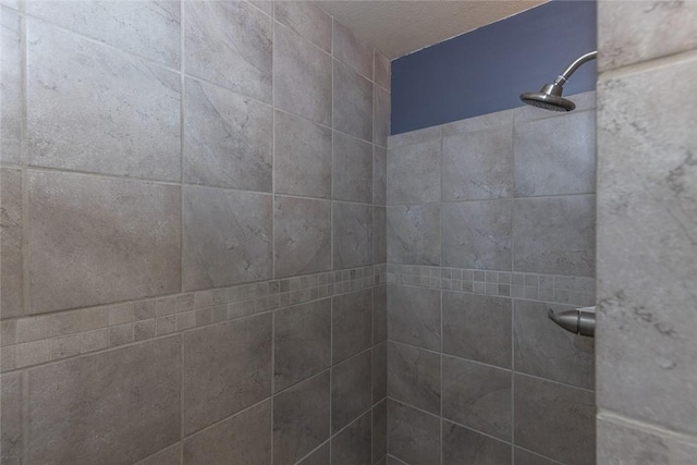 room details with a tile shower