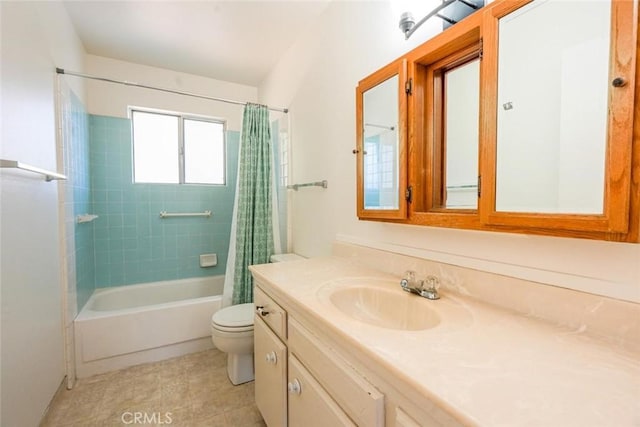 full bathroom with vanity, shower / bath combination with curtain, and toilet