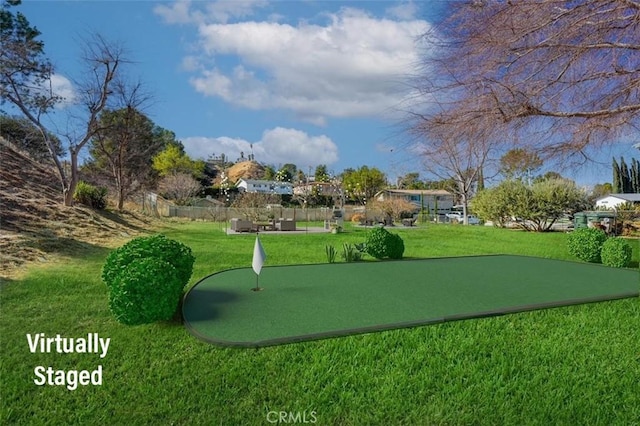 surrounding community featuring a lawn