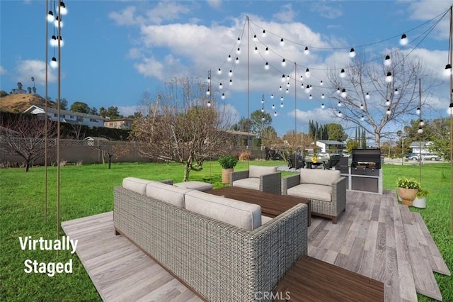 wooden deck with outdoor lounge area and a lawn