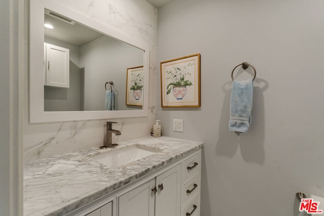 bathroom featuring vanity