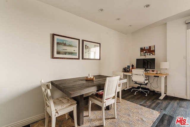 dining room featuring dark wood-type flooring