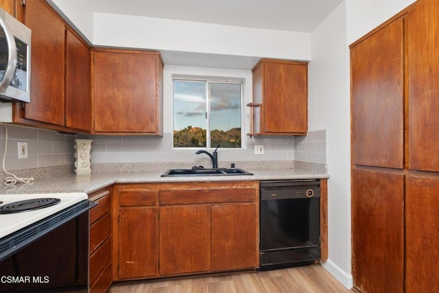 kitchen with sink, light hardwood / wood-style flooring, dishwasher, electric stove, and decorative backsplash