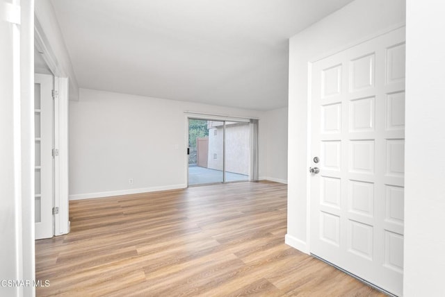 unfurnished room featuring light hardwood / wood-style floors