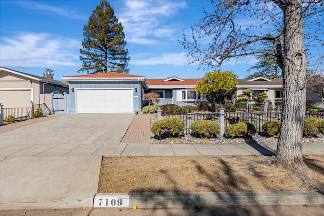 ranch-style home featuring a garage