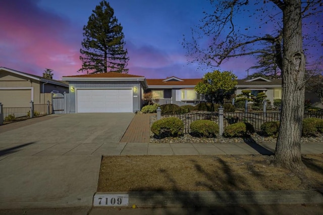 single story home featuring a garage