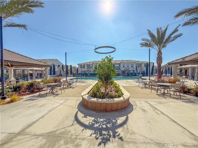 exterior space with a patio and a swimming pool