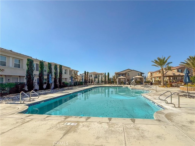 view of pool featuring a patio