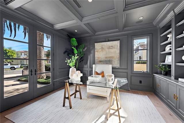 office area with french doors, ornamental molding, and coffered ceiling