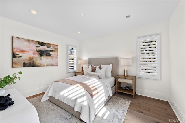 bedroom featuring hardwood / wood-style floors