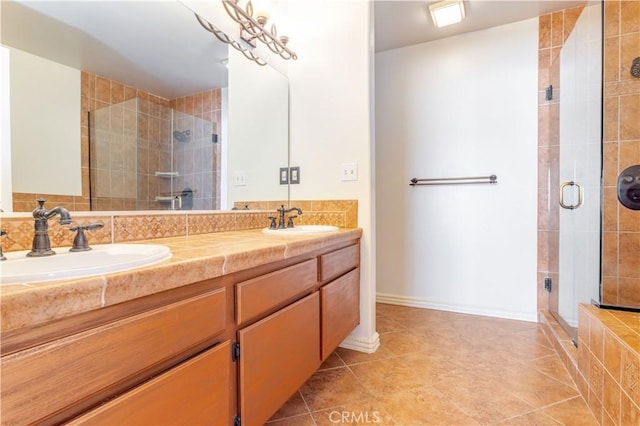 bathroom featuring vanity, decorative backsplash, tile patterned floors, and walk in shower