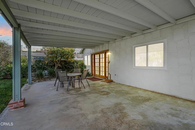 patio terrace at dusk with french doors