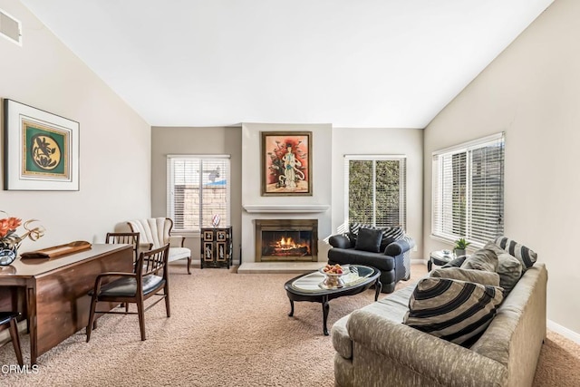 interior space featuring vaulted ceiling and carpet floors