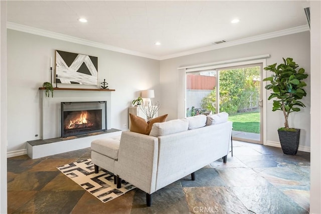 living room featuring crown molding