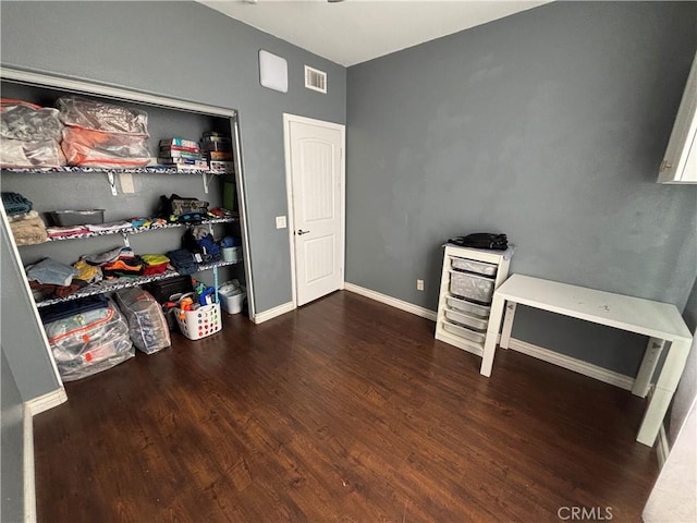 misc room featuring dark wood-type flooring