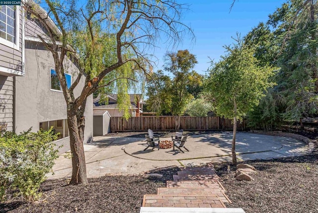 view of patio / terrace featuring a fire pit