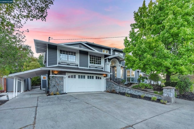 view of front of property with a garage