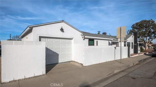 view of home's exterior with a garage