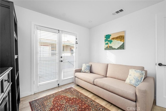 living room featuring light wood-type flooring