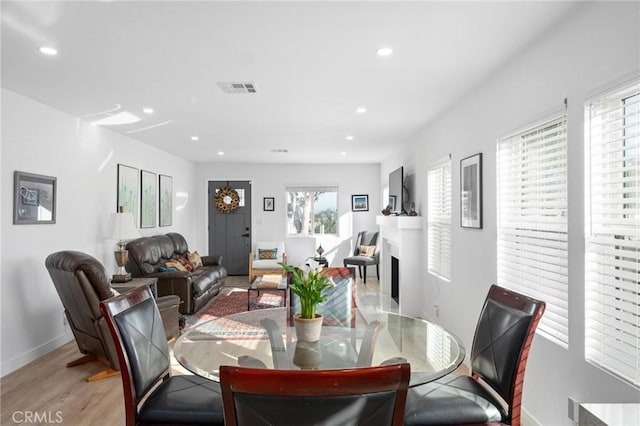 dining room with light wood-type flooring