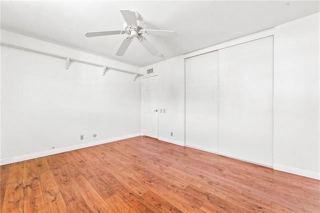 unfurnished bedroom featuring ceiling fan and light hardwood / wood-style floors