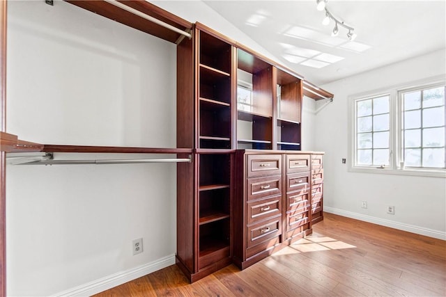 walk in closet featuring light wood-type flooring