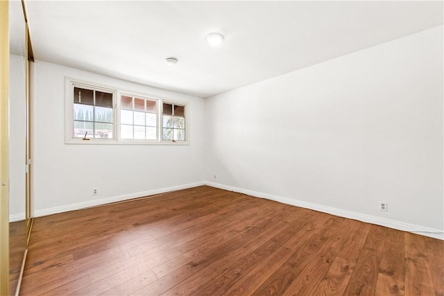 empty room featuring hardwood / wood-style floors