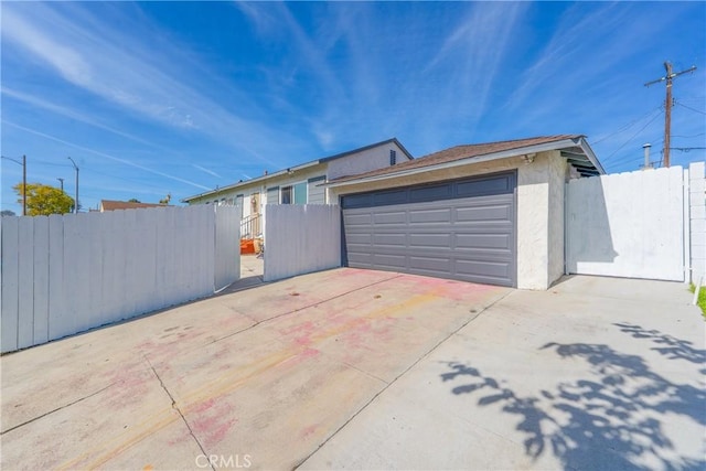 detached garage with fence