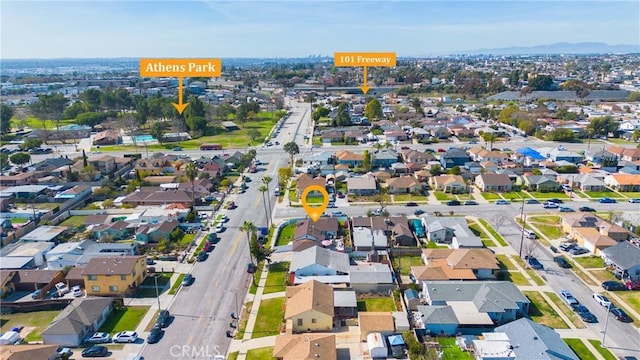 birds eye view of property with a residential view