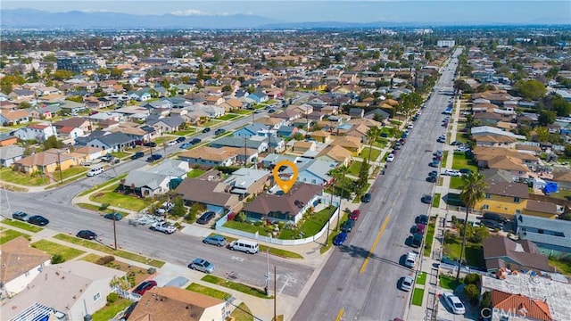 drone / aerial view with a residential view and a mountain view