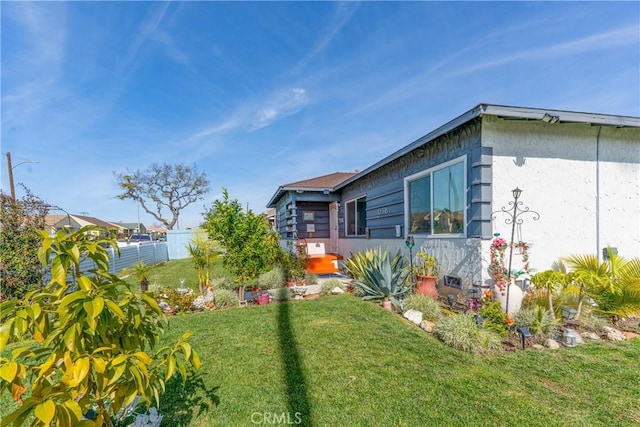 view of yard featuring fence