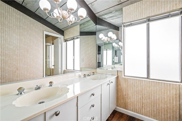 bathroom featuring vanity and wood-type flooring