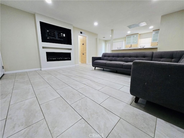 living room with light tile patterned floors