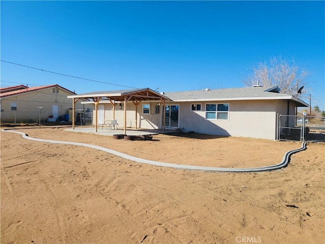 rear view of house with a patio area