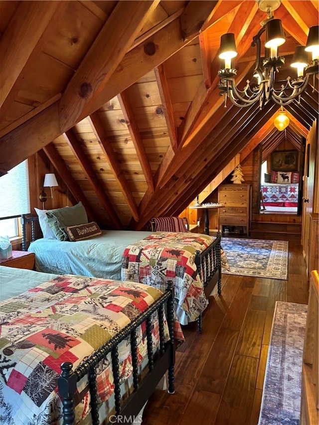 bedroom with an inviting chandelier, lofted ceiling with beams, hardwood / wood-style flooring, wood walls, and wooden ceiling