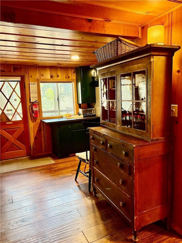 interior space with hardwood / wood-style floors and wooden ceiling