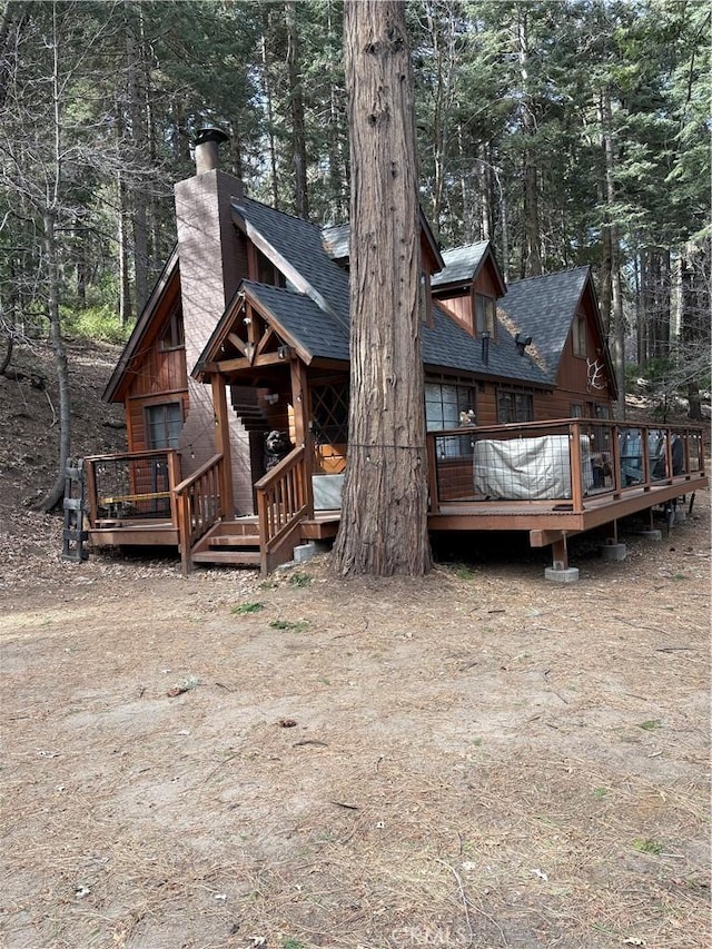 rear view of house with a deck