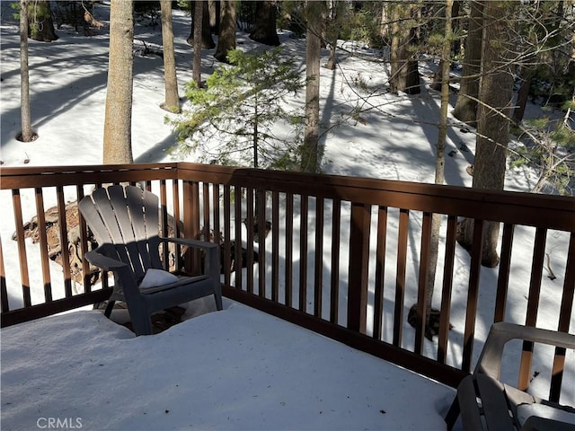 view of snow covered deck