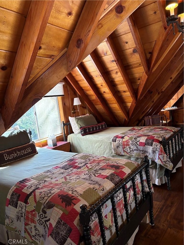 bedroom with wooden walls, wood ceiling, wood finished floors, and vaulted ceiling with beams