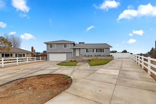 split level home with a garage