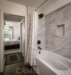 bathroom with shower / tub combo