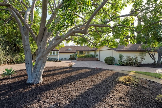 single story home featuring a garage