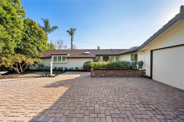 view of front of home featuring a patio area