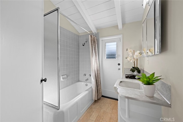 bathroom featuring wood ceiling, shower / tub combo, vaulted ceiling with beams, vanity, and wood-type flooring