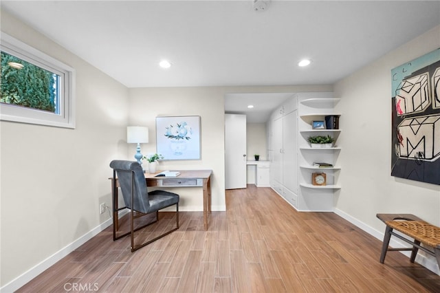 home office with light wood-type flooring