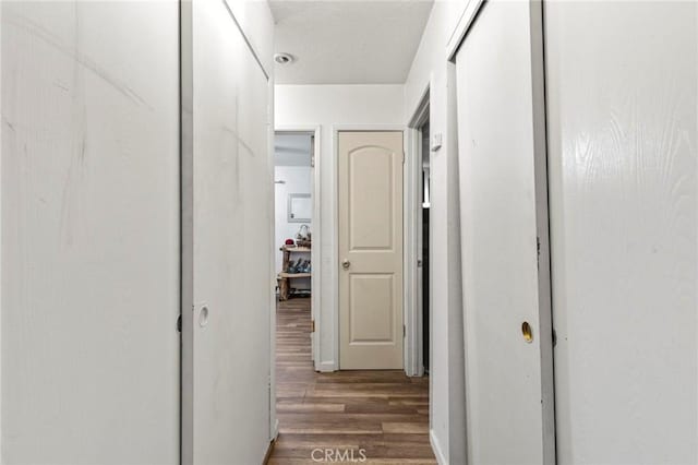 hall featuring dark hardwood / wood-style flooring