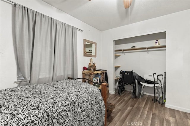 bedroom with hardwood / wood-style floors and ceiling fan